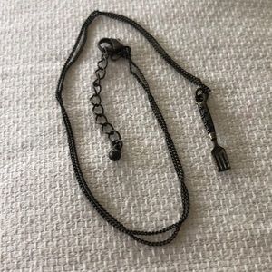 Adorable and simple fork necklace.